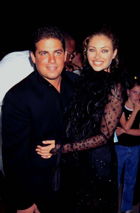 Rebecca Gayheart and Brett Ratner at an event for Money Talks (1997) Rebecca Gayheart and Brett Ratner at an event for Money Talks (1997)