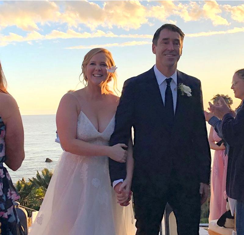 Amy Schumer with her husband Chris Fischer Amy Schumer with her husband Chris Fischer