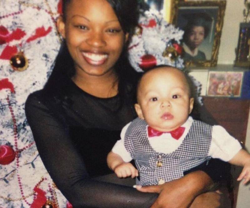 Young Larray with his mother Young Larray with his mother