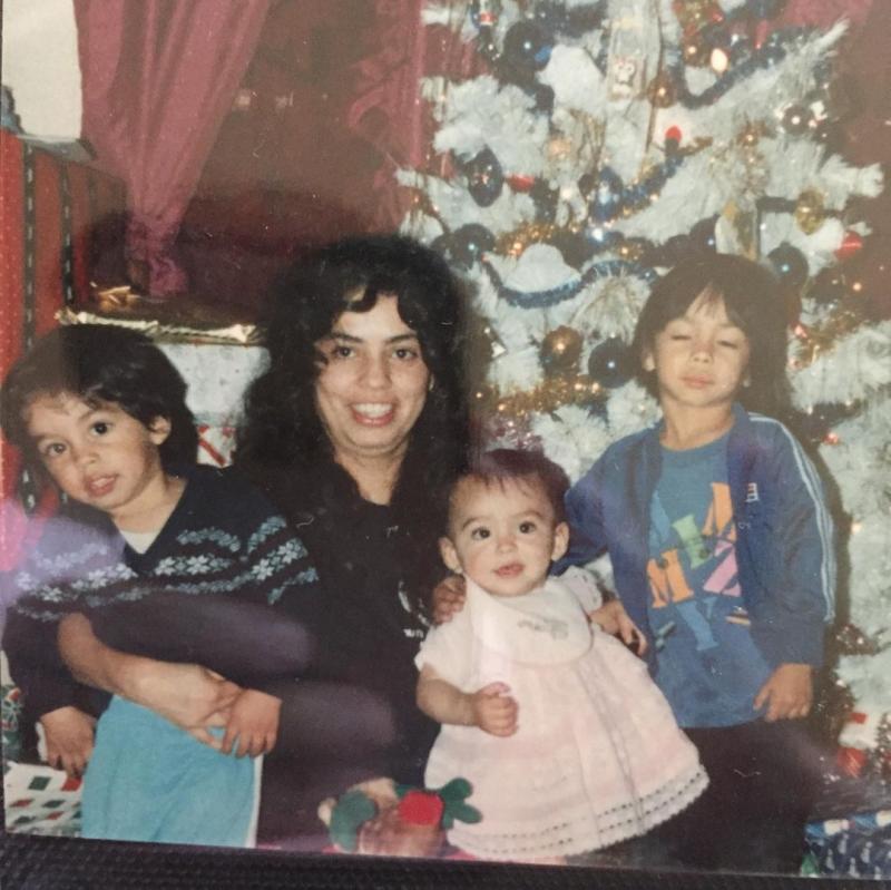 Young David Lopez with his mother and siblings Young David Lopez with his mother and siblings