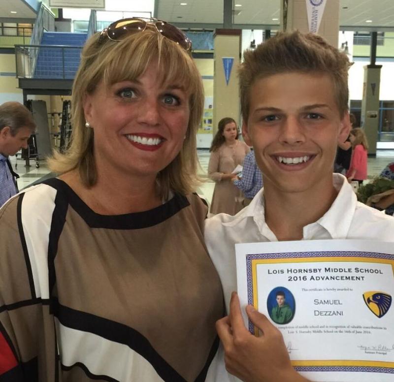 Young Sam Dezz with his mother Young Sam Dezz with his mother