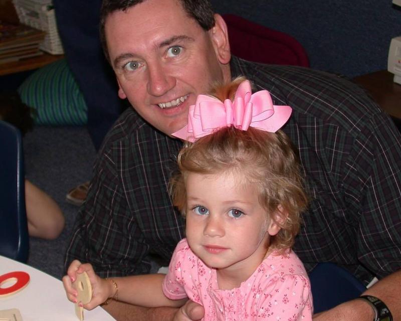 Young Olivia Rouyre with her father Young Olivia Rouyre with her father